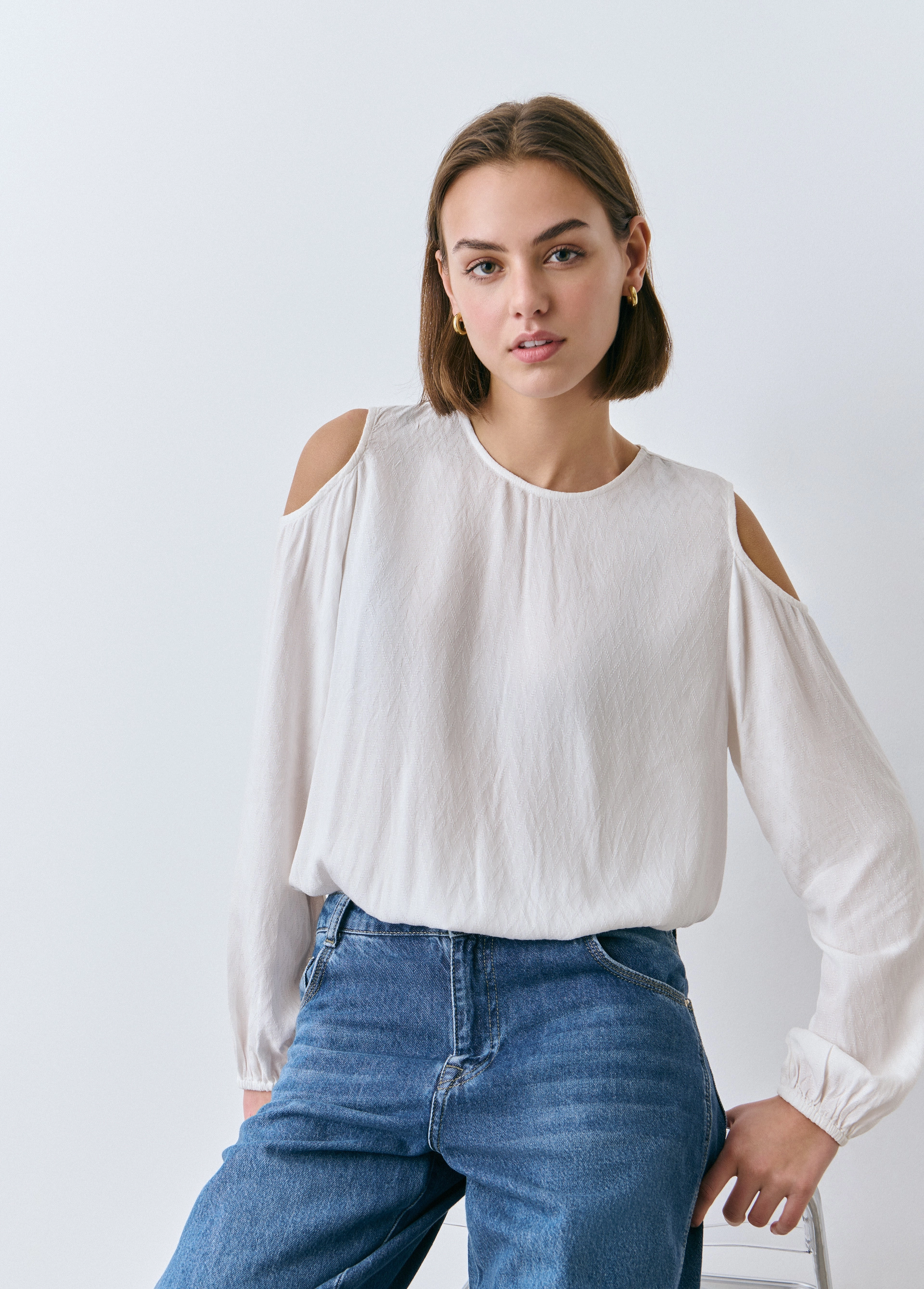 Blusa cut out spalle