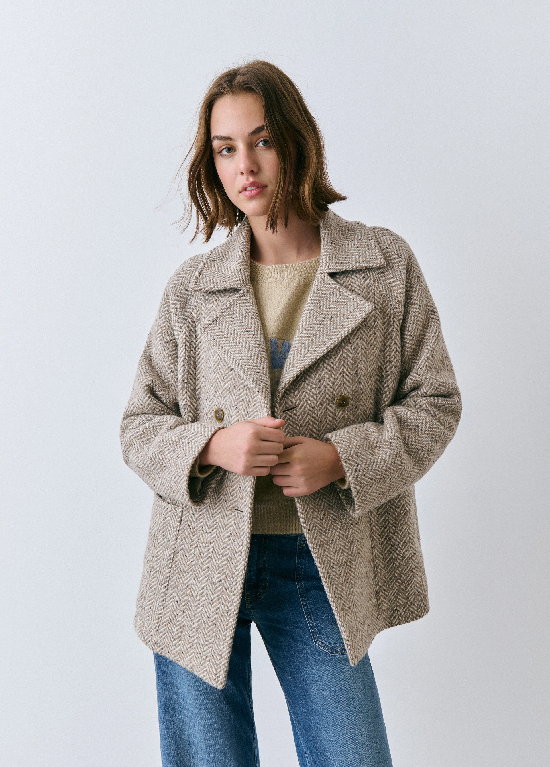 Herringbone crossover coat