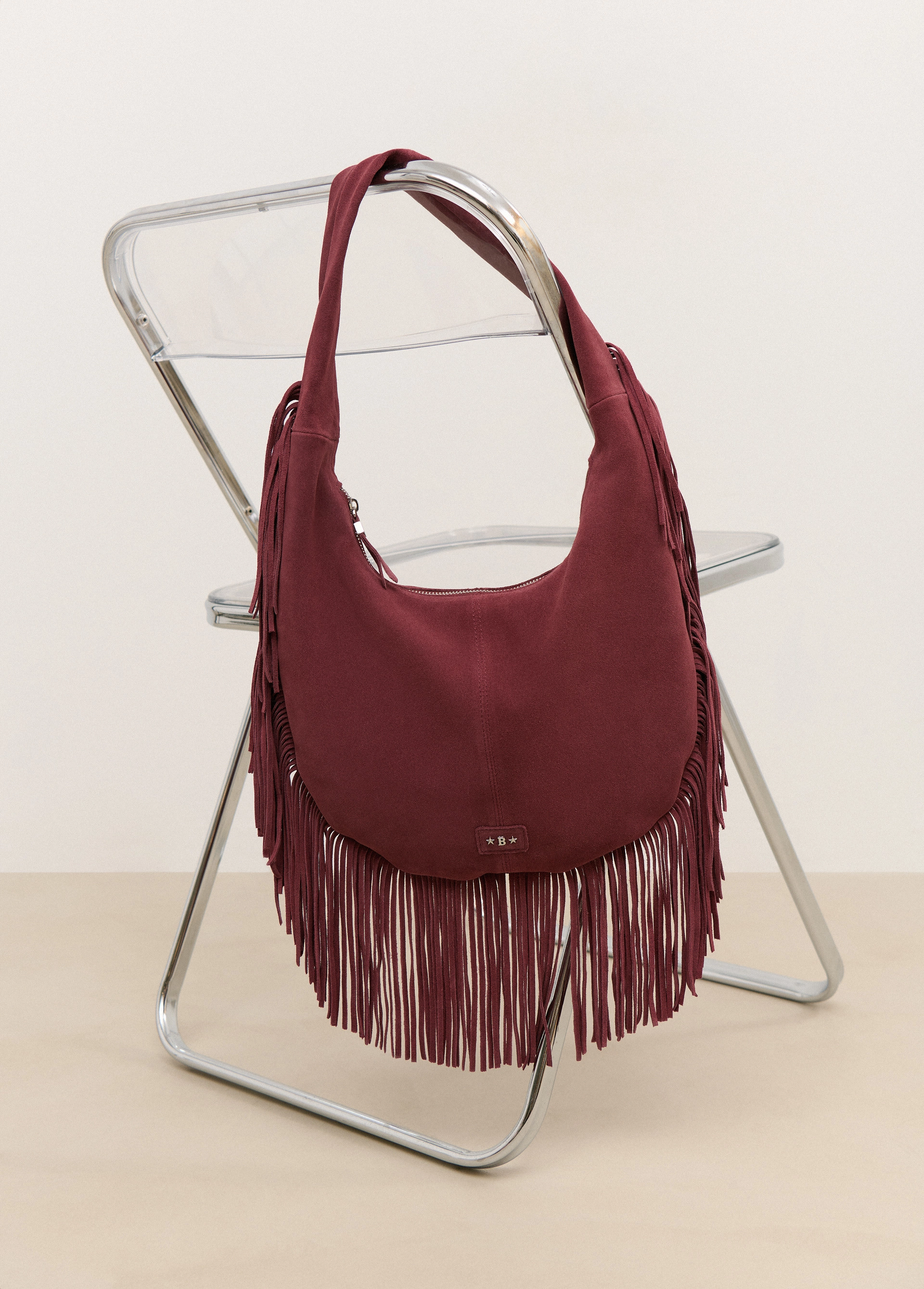 Fringed leather shoulder bag