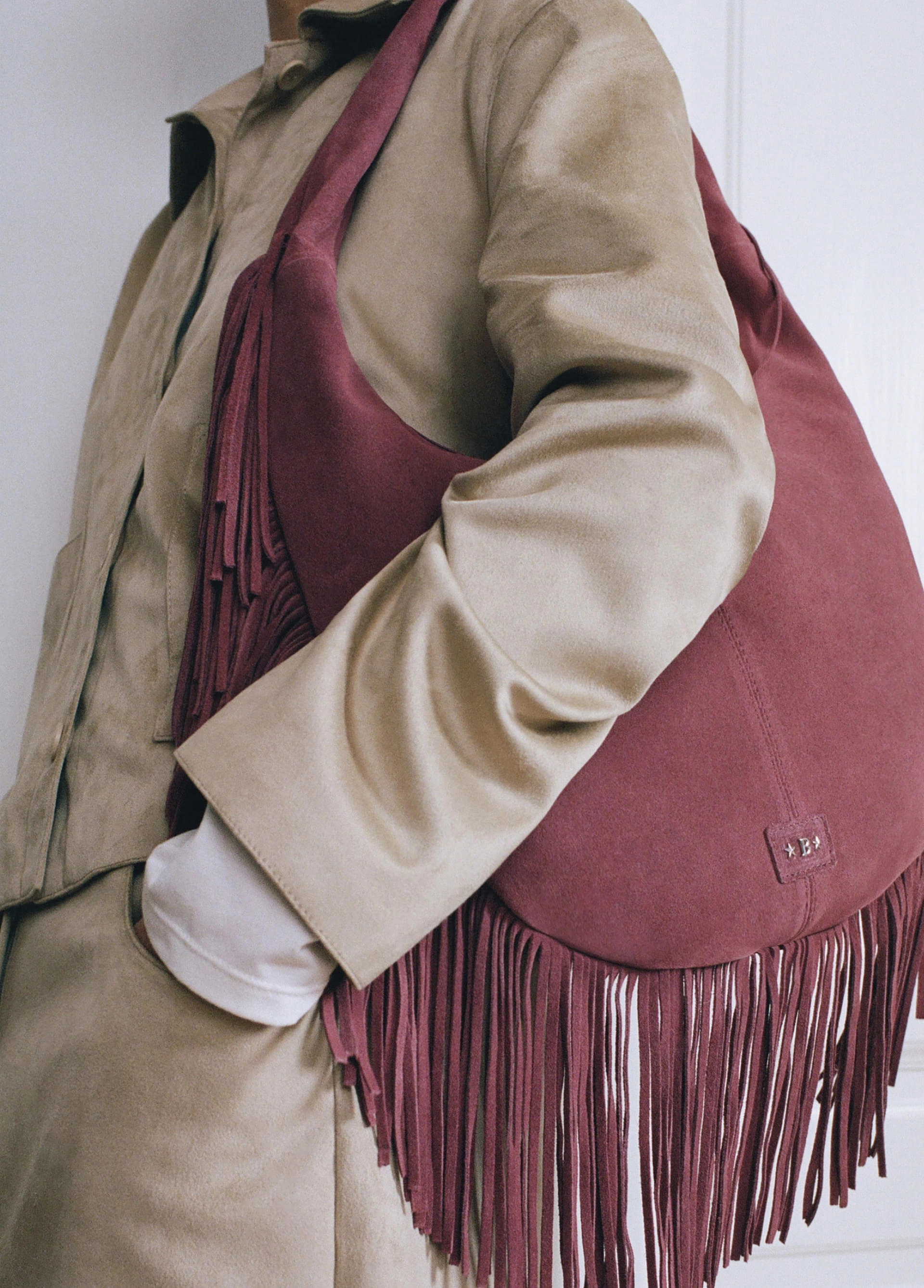 Fringed leather shoulder bag